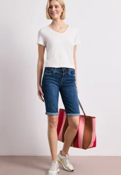 Bermuda en denim slim fit à revers