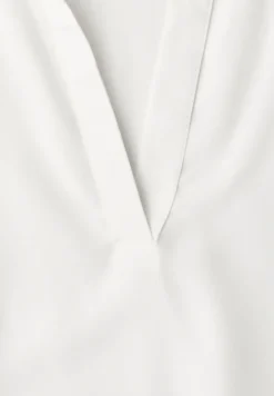 Blouse à col chemise et ourlet élastiqué