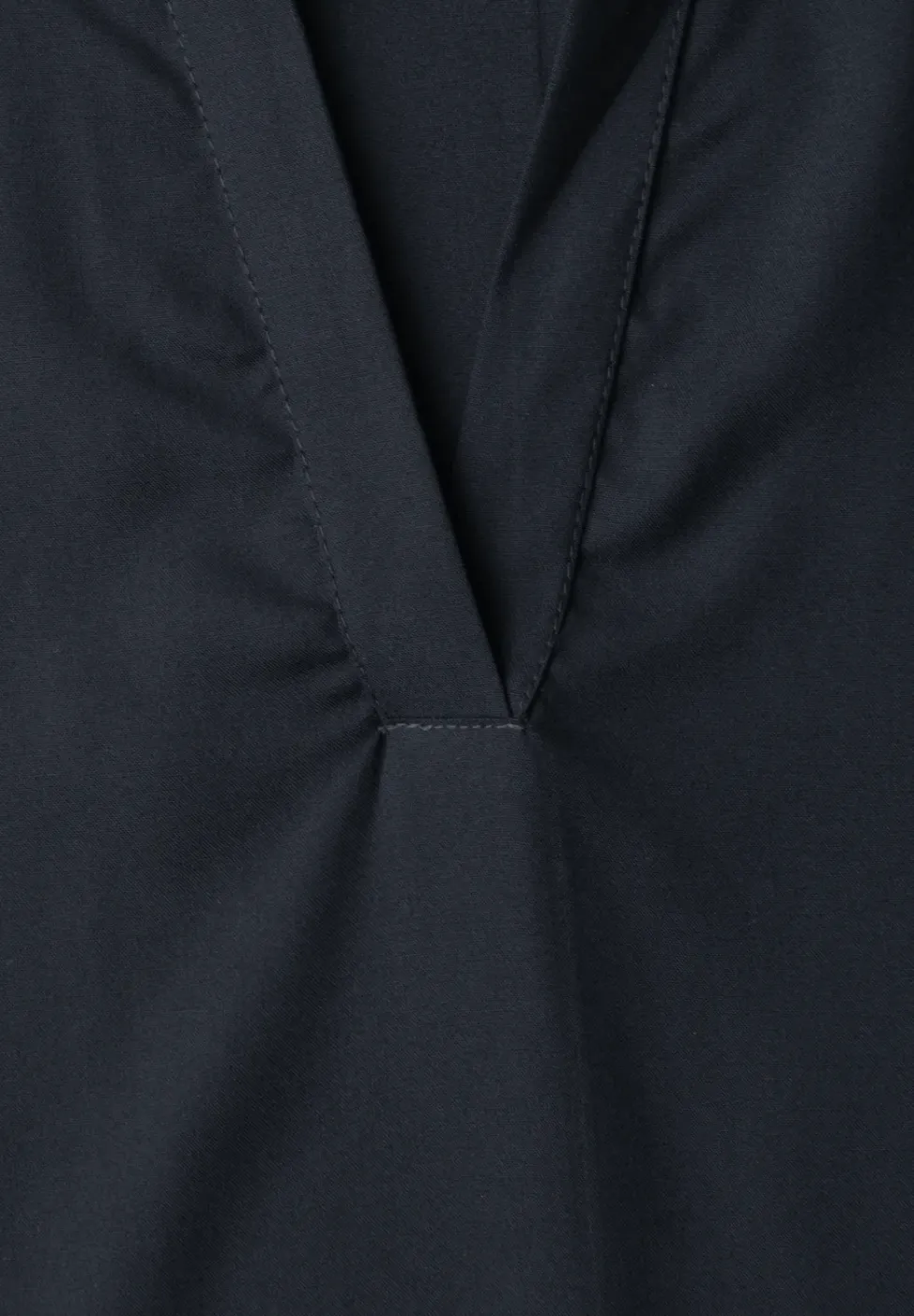 Blouse à col chemise et ourlet élastiqué