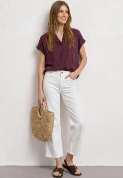 Blouse à col chemise et ourlet élastiqué