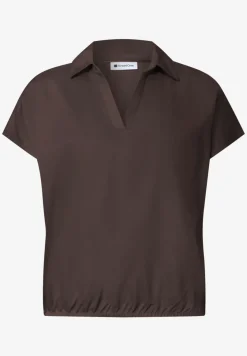 Blouse à col chemise et ourlet élastiqué
