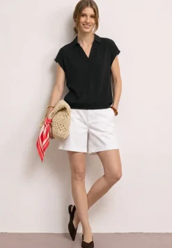Blouse à col chemise et ourlet élastiqué