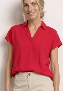 Blouse à col chemise et ourlet élastiqué