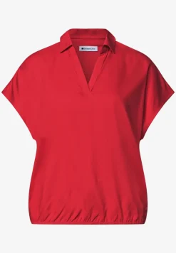 Blouse à col chemise et ourlet élastiqué