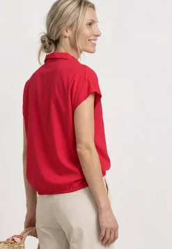 Blouse à col chemise et ourlet élastiqué