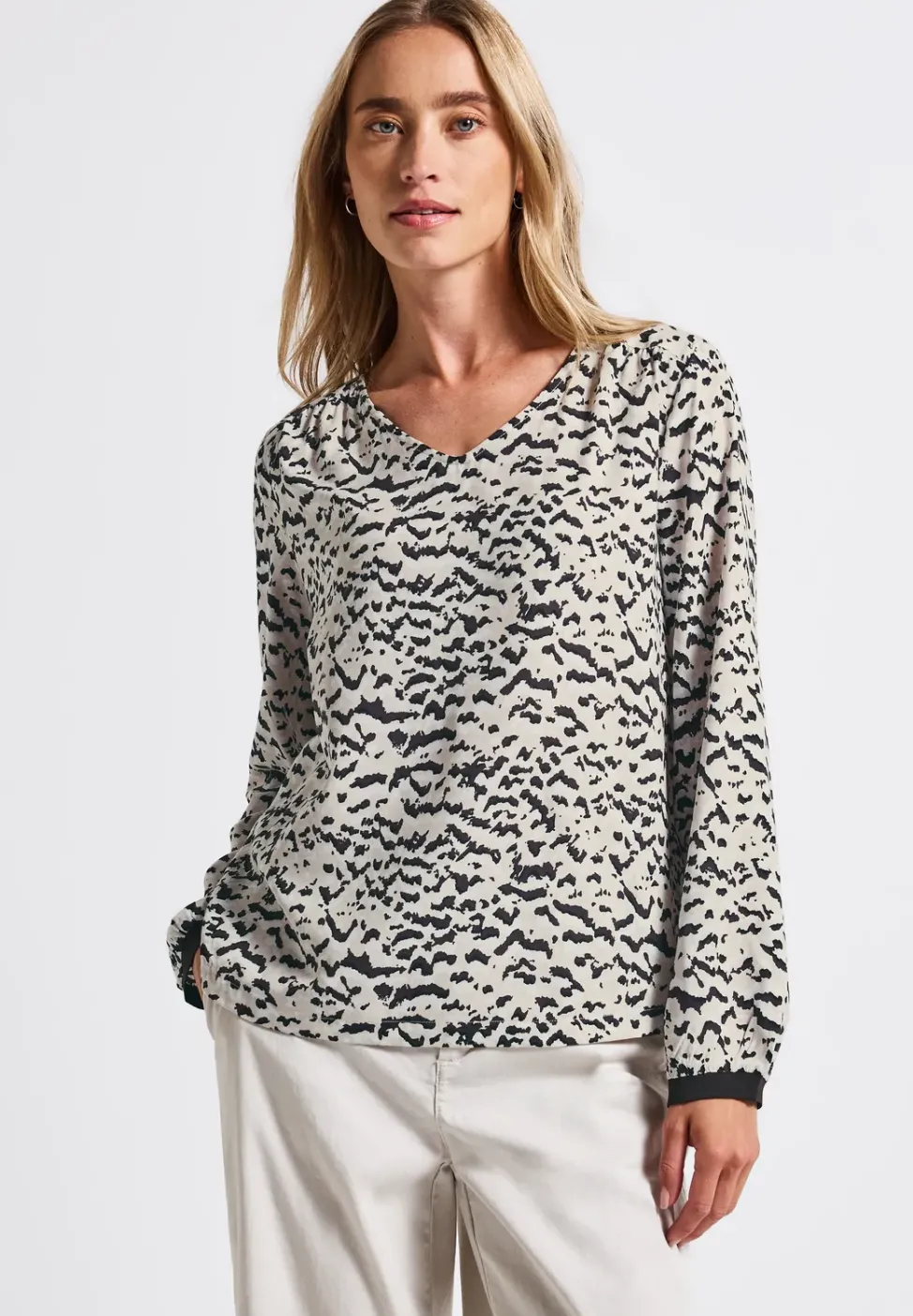 Blouse à col en V avec bande
