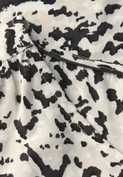 Blouse à col en V avec bande