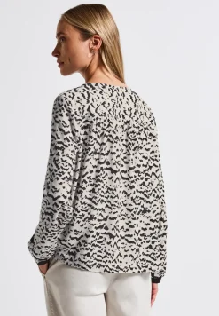 Blouse à col en V avec bande
