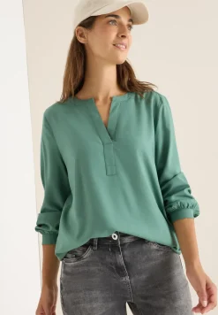Blouse à col fendu