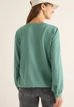Blouse à col fendu