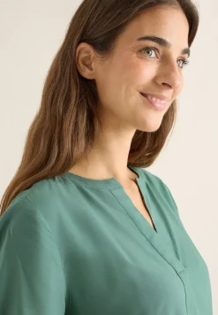 Blouse à col fendu