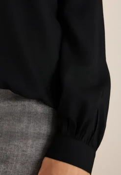 Blouse à col fendu