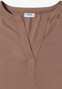 Blouse à col fendu