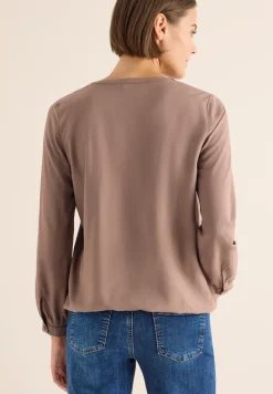 Blouse à col fendu