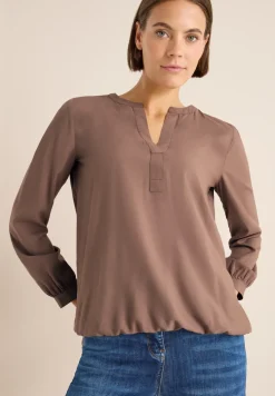 Blouse à col fendu