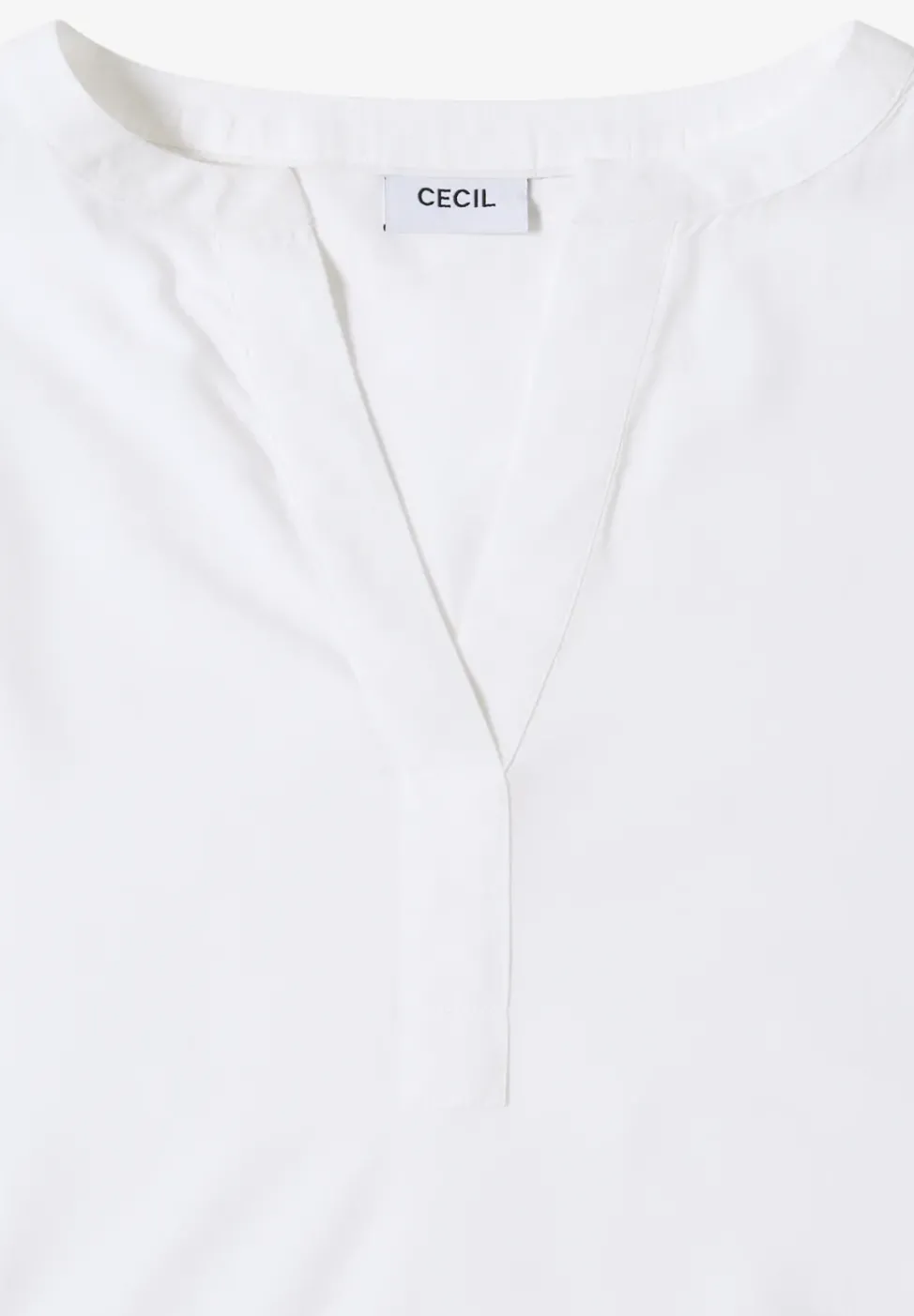 Blouse à col fendu