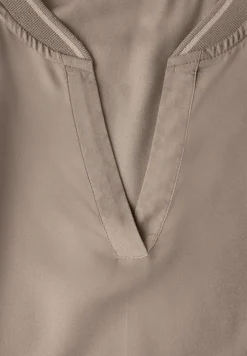 Blouse à col fendu avec bande