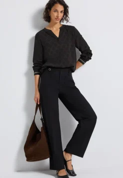 Blouse à col fendu avec bande