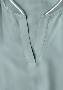 Blouse à col fendu avec bande