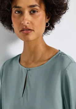 Blouse à col rond avec découpe