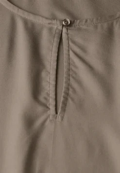 Blouse à col rond avec découpe