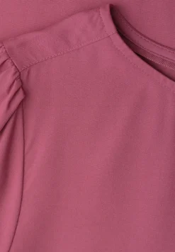 Blouse à col rond et manches courtes bouffantes