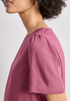 Blouse à col rond et manches courtes bouffantes