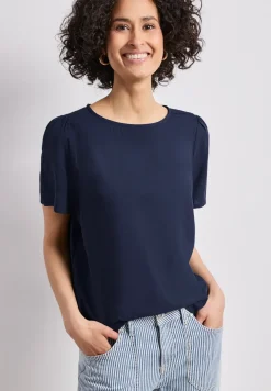 Blouse à col rond et manches courtes bouffantes