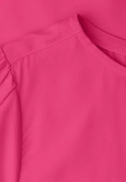 Blouse à col rond et manches courtes bouffantes