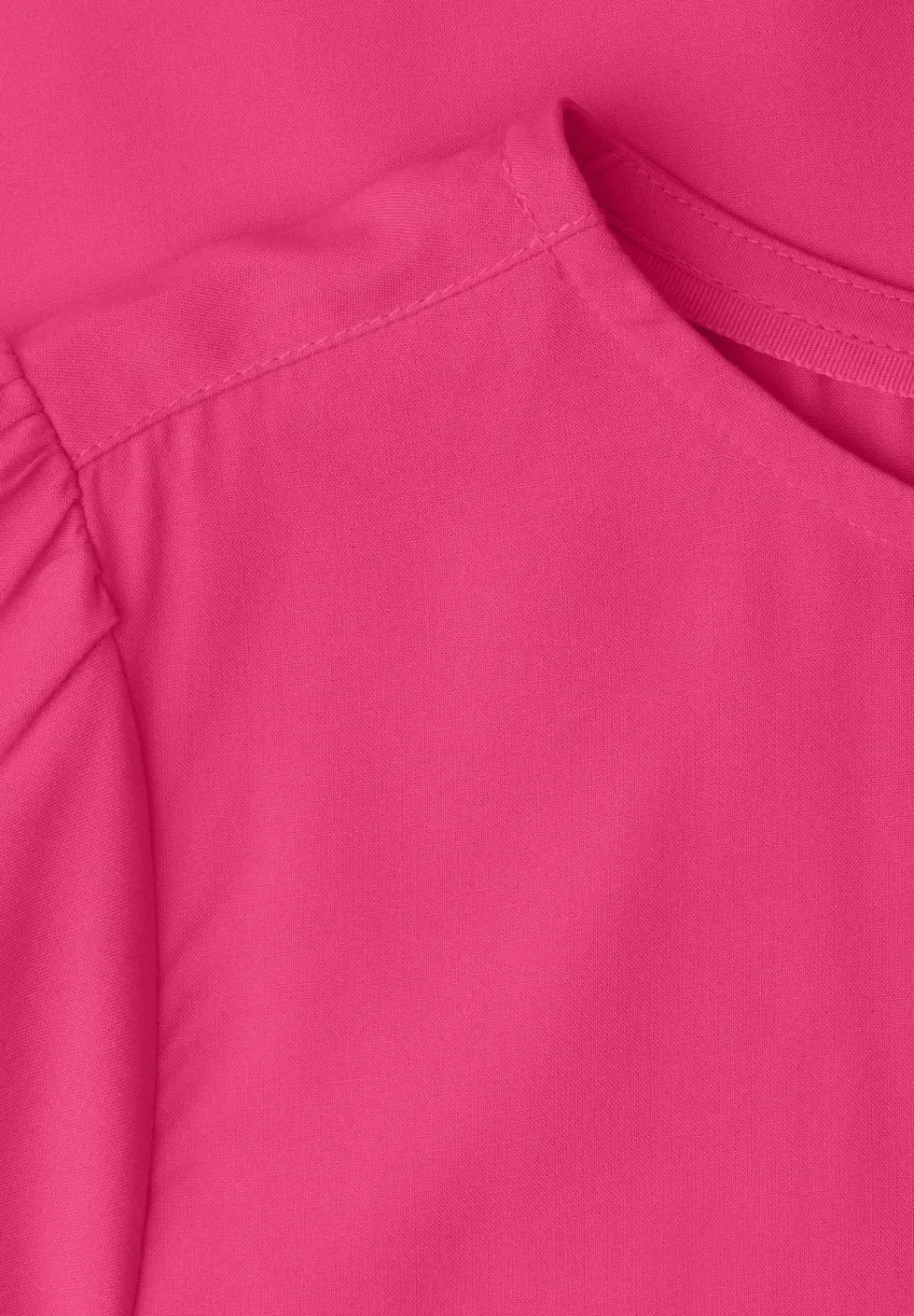 Blouse à col rond et manches courtes bouffantes