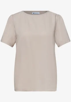 Blouse à col rond et manches courtes bouffantes