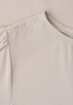 Blouse à col rond et manches courtes bouffantes