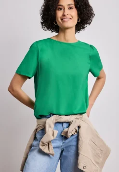Blouse à col rond et manches courtes bouffantes