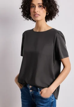 Blouse à col rond et manches courtes bouffantes