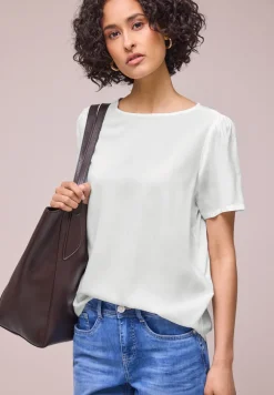 Blouse à col rond et manches courtes bouffantes