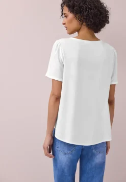 Blouse à col rond et manches courtes bouffantes