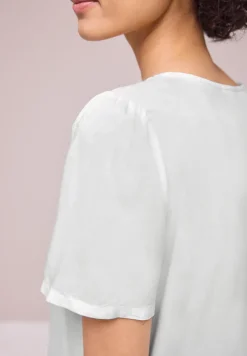 Blouse à col rond et manches courtes bouffantes