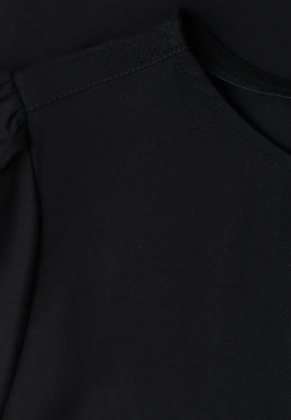 Blouse à col rond et manches courtes bouffantes