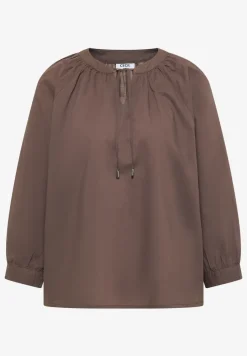 Blouse à manches 3/4 avec col fendu en couleur unie