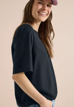 Blouse à manches 3/4 avec col fendu