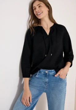 Blouse à manches 3/4 avec col fendu en couleur unie