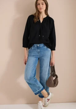 Blouse à manches 3/4 avec col fendu en couleur unie