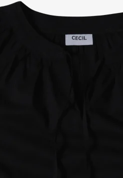 Blouse à manches 3/4 avec col fendu en couleur unie
