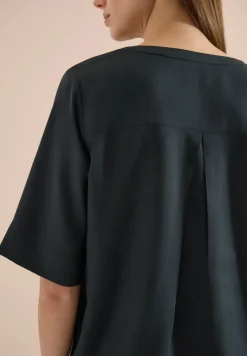 Blouse à manches 3/4 avec col fendu