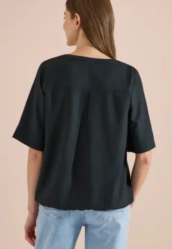 Blouse à manches 3/4 avec col fendu