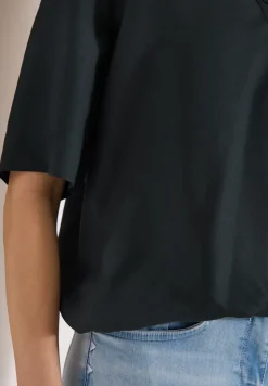 Blouse à manches 3/4 avec col fendu