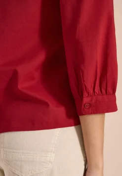 Blouse à manches 3/4 avec col fendu en couleur unie