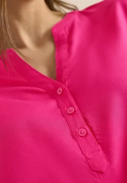 Blouse à manches 3/4 avec col fendu