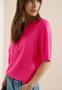 Blouse à manches 3/4 avec col fendu