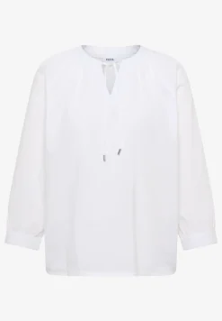 Blouse à manches 3/4 avec col fendu en couleur unie